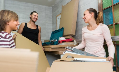 Removal van loading household items for a Wimbledon move