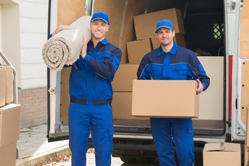 Removal team loading household items in Wimbledon