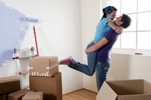 Furniture and boxes prepared for transport with a Wimbledon moving van