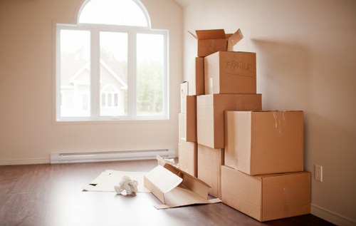 Packed boxes and furniture ready for a local Wimbledon home removal