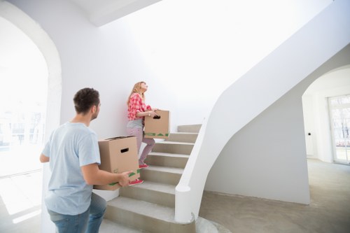 Careful furniture moving inside a Wimbledon home