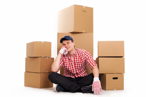 Furniture and boxes being arranged in a removal van