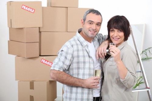 Professional movers handling office equipment in Wimbledon